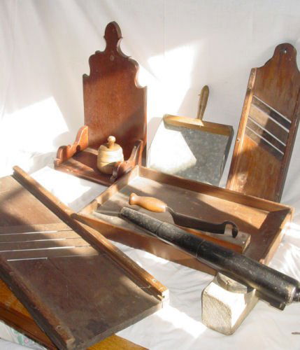 assorted lot of country items: lot including chopper, butter mold, 2 graters, pine shelf, toy cannon, scoop