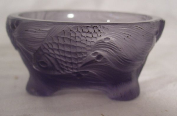attributed Lalique bowl: 4" tall purple footed bowl with embossed fighting fish design, flaw to side probably in the making