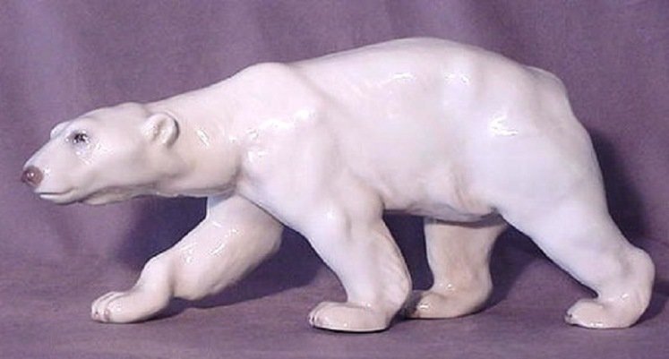Bing and Grondahl Polar Bear Signed and Dated 1912: This Large Bing and Grondahl Porcelain Hand Painted Polar Bear is Hand Incised on one of the front paws NN for Artist Niels Nielsen with the date 1912. True to Life Detail and Color. First Quality Bin