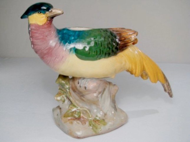Hand Painted Majolica Porcelain Bird Figurine 12": This Wonderful Hand Painted Majolica Porcelain Bird Planter measures 12" Long by 8 1/2" Tall. This is a Beautiful Detail planter and signed Jerome Massier on the bottom as pictured.