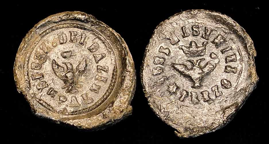 EARLY ITALIAN LEAD SEAL, c. 19th century.: EARLY ITALIAN LEAD SEAL, c. 19th century. Stamped both sides with an eagle, one double headed, with spread wings with crowns above, legend around. Both sides different. 0.8 inches. Uncertain use perha