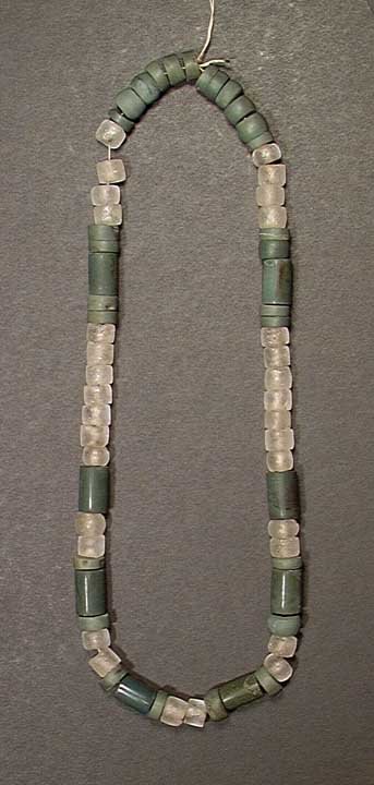 FINE CALIMA QUARTZ & GREENSTONE NECKLACE: PRE-COLUMBIAN. FINE CALIMA QUARTZ & GREENSTONE NECKLACE. Cauca valley, ca. 500BC-500AD. Hand carved & drilled beads. Rare and wearable. 25". Provenance: Purchased by the present owner from a major New