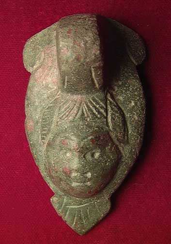 ROMAN BRONZE HANDLE MOUNT: A ROMAN BRONZE HANDLE MOUNT, ca. 1st-3rd century AD. With a facing head. 2.25 inches. Provenance: An extensive 20th century New Jersey collection. Assembled over the past 35 years. All pieces have bee