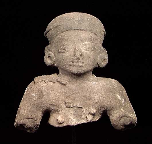 LARGER TUMACO-LA TOLITA BUST: PRE-COLUMBIAN LARGER TUMACO-LA TOLITA BUST, ca. 300BC-200AD. The figure with remains of large pectoral, especially in the back. 3.8 x 5.5". On custom stand. Provenance: An extensive East Coast Pre-Col