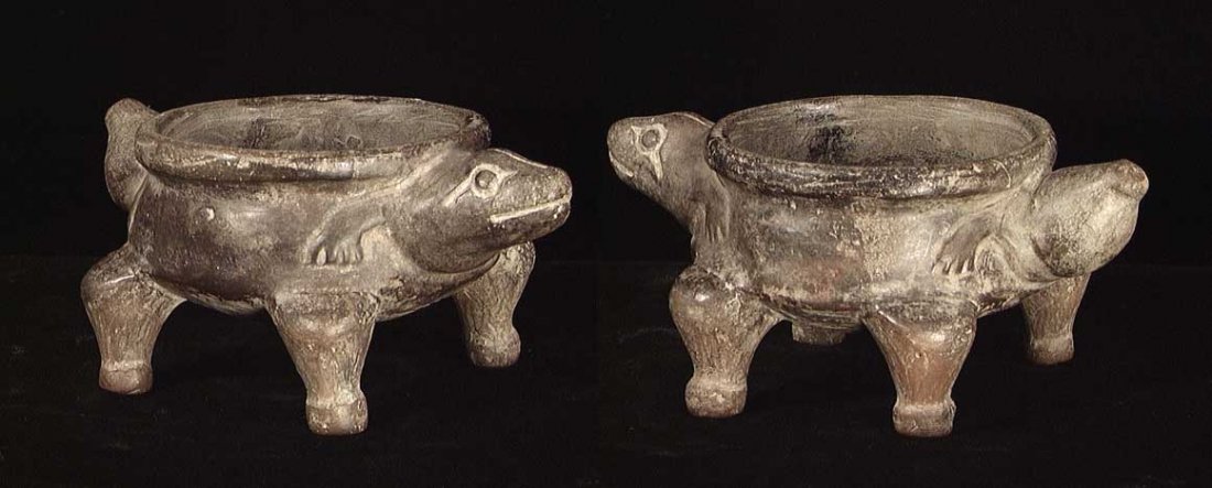TAIRONA ZOOMORPHIC VESSEL: PRE-COLUMBIAN. TAIRONA ZOOMORPHIC VESSEL. Columbia, ca. 800 AD. The four legged vessel with the head and forlegs of an uncertain animal one side, tail and hind legs on the other. 5.5 inches. Nice exam
