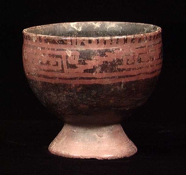 NARINO PEDESTAL BOWL: PRECOLUMBIAN. NARINO PEDESTAL BOWL. Capuli complex, ca. 850-1500 AD. Red on black resist painted with stairstep and other designs. 5 x 5.5". Museum number on bottom. Provenance: An extensive East Coas