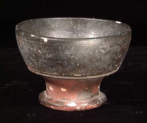 ELEGANT SMALL GREEK BLACK-GLAZED CUP: A SMALL GREEK BLACK-GLAZED CUP, ca. 4th century BC. Nicely turned with pedestal base. 2 x 3.1 inches. Intact. Provenance: An extensive 20th century New Jersey collection. Assembled over the past 35 ye