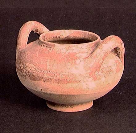 SOUTH ITALIAN MASTOID CUP: SOUTH ITALIAN MASTOID CUP, c. 5th century BC. The cup with distinctively upturned handles, remains of glaze on upper half. 3.25". Rare form. Provenance: An extensive 20th century New Jersey collection