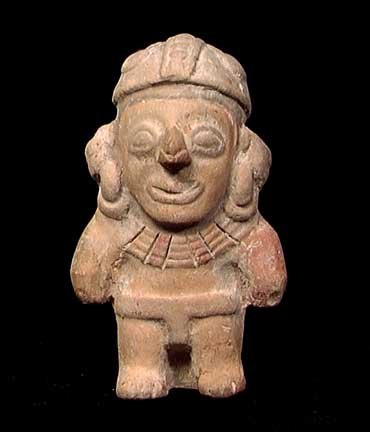 CUTE JAMACOQUE FIGURAL WHISTLE: CUTE JAMACOQUE FIGURAL WHISTLE, c. 500 AD. Standing figure with helmet and loin cloth. Considerable polychrome remaining. 2.9". Provenance: An extensive East Coast Pre-Columbian collection. Acquired f