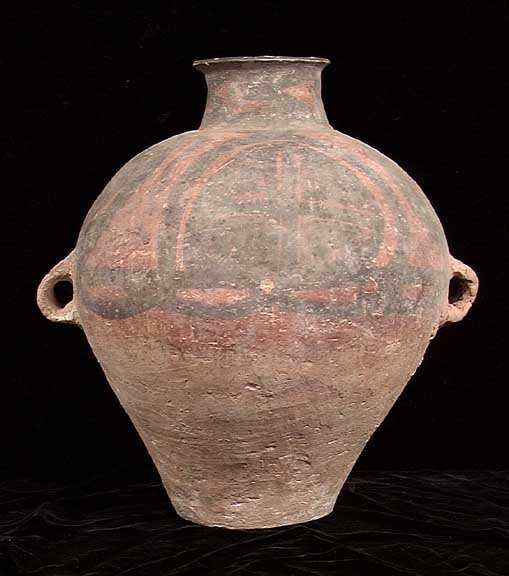 PUBLISHED CHINESE NEOLITHIC VESSEL: PUBLISHED IN 'ORIENTAL ANTIQUES AND ART' CHINESE NEOLITHIC VESSEL, Kansu, Yangshao culture, ca. 2500 BC. The two handled pot with black cross within circle designs on red background, small loop handle