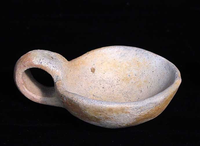 EUROPEAN BRONZE AGE DIPPER CUP: EUROPEAN BRONZE AGE DIPPER CUP. Central Europe, 3rd-2nd millennium BC. 1.25 x 3.5 inches. Provenance: An old Eastern European collection. Formed in the early to mid 20th century. All pieces have been 