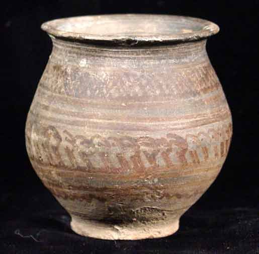 ORNATE EARLY INDUS VALLEY IBEX VESSEL: ORNATE EARLY INDUS VALLEY FIGURAL VESSEL, Mehrgarh Culture, Indus Valley, c. 3rd millennium BC. The pot painted with a register of numerous small ibex within linear and cross hatch bands. Light lime d