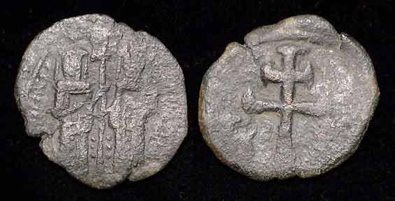 RARE BYZANTINE COIN WITH LARGE CROSS: RESTORED BYZANTINE (PALAEOLOGIAN) EMPIRE, ANDRONICUS II AND MICHAEL IX, 1295-1320. AE Assarion, Sear 2451. The two emperors stg. facing holding labarum/Large patriarchal cross flanked by two large B��