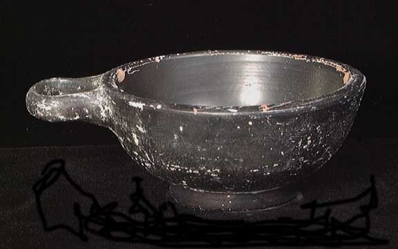 CAMPANIAN ONE-HANDLED CUP: CAMPANIAN ONE-HANDLED CUP, c. 4th century BC. The cup with ring base. 4.9" width across handle. Couple of small flakes. Provenance: An extensive 20th century New Jersey collection assembled over the p
