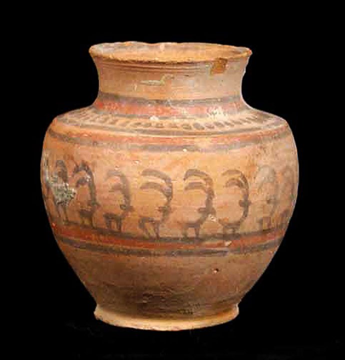 BEAUTIFUL INDUS VALLEY POLYCHROME VESSEL: MEHRGARH BICHROME FIGURAL POT, Indus Valley, c. 3rd millennium BC. The pot painted with a register of numerous small ibex within linear bands. Light lime deposits attesting authenticity. 2.5 x 3 inche