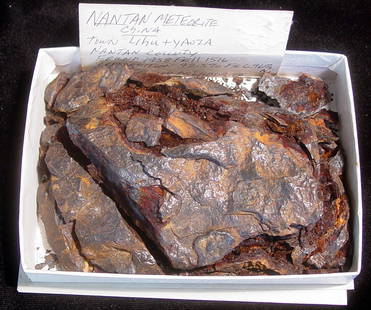 NANTAN IRON METEORITE: NANTAN IRON METEORITE. China, Lihu town, Ladan/Bayan area, 1516 AD. Coarse octohedrite meteorite, 92.5% Fe, 6.96% Ni. 1.5 x 3.25 x 5.3 inches. 1 lb 14.oz. Quite a large example. This fall is recorded