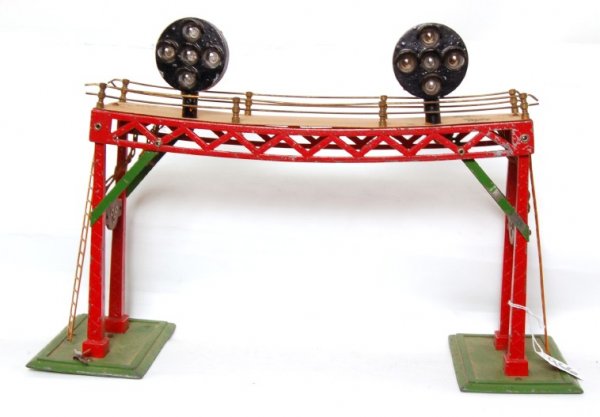 Tough Dorfan No. 419 signal bridge: Dorfan No. 419 signal bridge with two position light signals, extremely hard to find accessory, original condition, has the warp in the center that they all have, C6. Includes two Dorfan controllers.