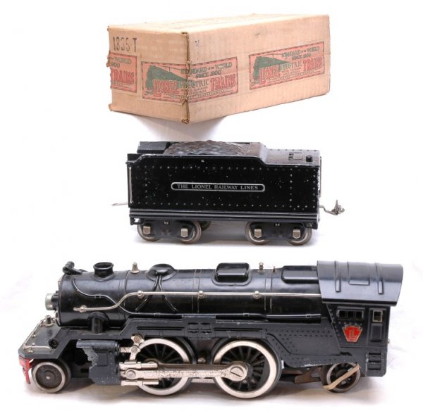 Lionel Black 1835E Steam with 1835W Tender OB: Lionel prewar standard gauge black 1835E steam with 1835W tender. Loco is missing rear wheel and one flag holder. One steam chest is half broken off and the other is cracked, C5. Diecast tender shell