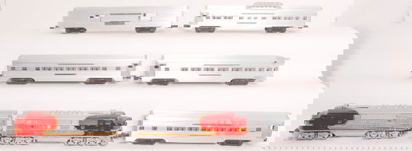 Lionel boxed 2190W, 2343 Santa Fe pass set: Lionel boxed set 2190W. Includes 2343 Santa Fe AA units, 2530 baggage car, 2532 dome car, 2533 Pullman car, 2534 Pullman car and 2531 observation car. Trains are quite nice C7. Boxes are worn, no inse