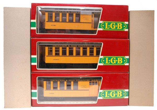 LGB D and RG 3080 and two 3081 LN Boxed: LGB G scale three Denver and Rio Grande Western passenger cars; 3080 passenger and two 3081 baggage cars in OBs with inserts also includes two outer sleeves. All are in like new condition.