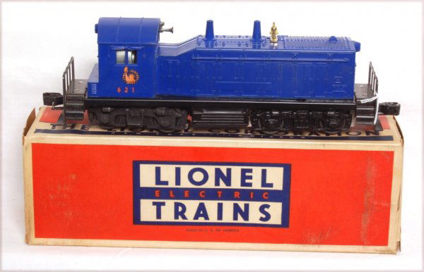 Lionel 621 Jersey Central switcher, unrun, OB: Lionel 621 Jersey Central switcher, very faint hairline at the screw otherwise C8, unrun. OB is nice but does have some tape on the inside on one end.