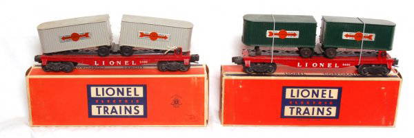 Two Lionel 6430 flats with original trailers, OB: Two Lionel 6430 flats with trailers, original postwar trailers, one is missing the front wheels, C6-7. Includes two C7 area original boxes.