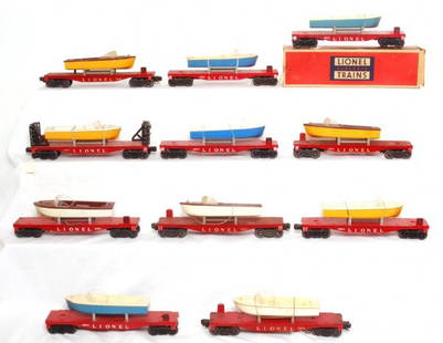 Eleven Lionel 6801 flatcars with boats: Eleven Lionel misc. 6801 flats with original boats, a few of the boats have a nicks, most will clean quite nice, one flat is 6477. Will clean in the C6-7 area.