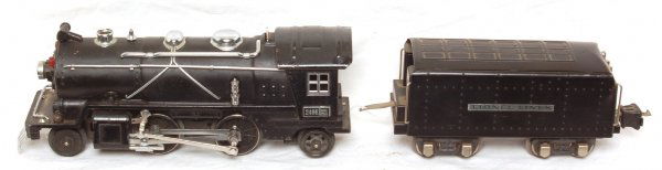 Lionel 249E 2-4-2 steam loco and tender Black: Lionel 249E 2-4-2 steam loco and tender. Loco was tested on a short test track operating smoothly in forward and reverse. This lot is sold as is shown in the photo with no returns.