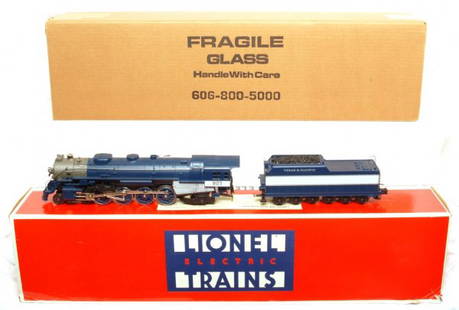 Lionel 18025 Texas and Pacific L-3 4-8-2 in OB: Lionel 18025 Texas and Pacific L-3 4-8-2 steam locomotive in original box, beautiful C7. Box is worn. Associated literature is present. Display case is factory sealed.