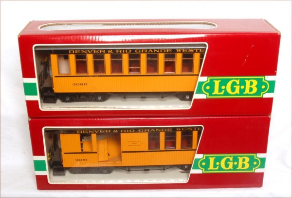 LGB 3080 and 3081 D and RGW pass. cars in OBs: LGB 3080 and 3081 Denver and Rio Grande Western passenger cars in original boxes. 3081 has most of its interior pieces loose, needing reglued. Cars otherwise look C8. Boxes show very little wear.