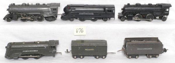 Lionel 1666, 265W, 1689E and tender, 1684, 1688: Lionel 1666, 265W, 1689E and tender, 1684, 1688. Items in this lot are sold as is shown in our photos with no returns.