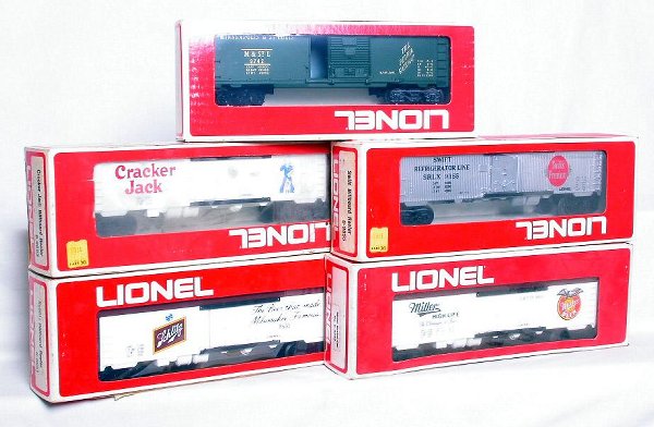 Lionel 9742, 9855, 9851, 9852 and 9853 in boxes: Lionel 9742 M&StL, 9855 Swift, 9851 Schlitz, 9852 Miller and a 9853 Cracker Jack, all in boxes. C7-9.