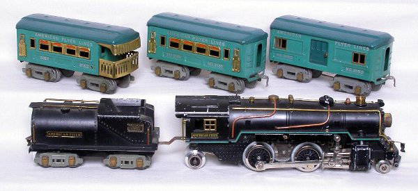 American Flyer prewar steam engine pass set: American Flyer prewar steam locomotive and tender with 3161, 3150 and 3162 in blue. Strong lettering on cars, C4. Engine has repro wheels.