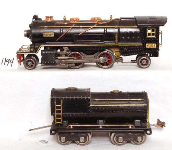 Lionel No. 260E 2-4-2 loco and tender: Lionel No. 260E 2-4-2 loco and tender, tender has a repaired coupler, otherwise trains should clean to C6 area.
