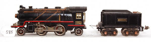 Lionel 262E 2-4-2 loco and 262T tender: Lionel 262E 2-4-2 loco and 262T tender, loco has had a red stripe added and tender has a replaced coupler, C6+.
