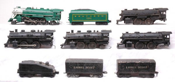 Lionel 1060 1061 1130 2034 1666 Locos and Tenders: Lionel postwar steam locos; 1060, 1061, 1130 and 2034 with two Lionel Scout tenders and one slope back tender. Also included is a restored 1666 Southern loco and tender. Please view locos and tenders
