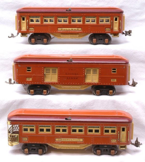 Lionel Terra Cotta 613 614 615 Passenger Cars: Lionel prewar O gauge passenger cars; 614 baggage, 613 Pullman, and 615 observation. The cars have terra cotta bodies with maroon roofs and copper journals. C6.
