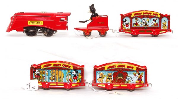Pride Lines Mickey Mouse Circus Train Set: Pride Line Mickey Mouse Disney Circus train set, looks C9 however is graded C8 due to having been run. Original box is not shown in photo but is included.