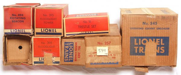 Ten original Lionel postwar accessory boxes: Ten original Lionel postwar accessory boxes: two 395 floodlight towers, two 494 rotating beacons, two 345 operating culvert unloader, 257 station with horn, 362 barrel loader, 111 trestle set and an o