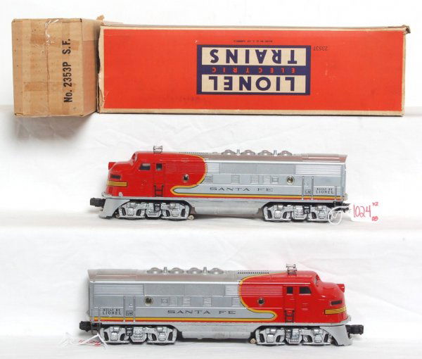 Lionel 2343 Santa Fe F3 AA units, OB: Lionel 2353 Santa Fe F3 AA units, strong lettering, C7+, original portholes, one spot that shows in the photo above the pilot is actually silver paint and not a chip. The power unit box is very nice,