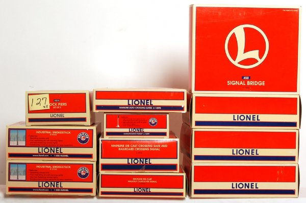 Four Lionel 12895, 14098, 22946, 22934, more: Four Lionel 12895 No. 450 signal bridges, 14098 mainline crossing gates, 22946 mainline diecast crossing gate and railroad crossing signal, 22934 mainline diecast walkout cantilever signal, 12744 No.