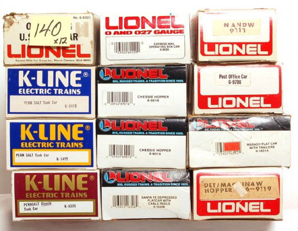 Nine Lionel and three K-Line freight cars in OB: Nine Lionel freight cars and three K-Line freight cars in original boxes, C6-9. Lionel: 9301 operating U.S. mail, 9708 Post Office, 9717 Norfolk and Western hopper, 16314 Wabash flatcar w/trailers, 91