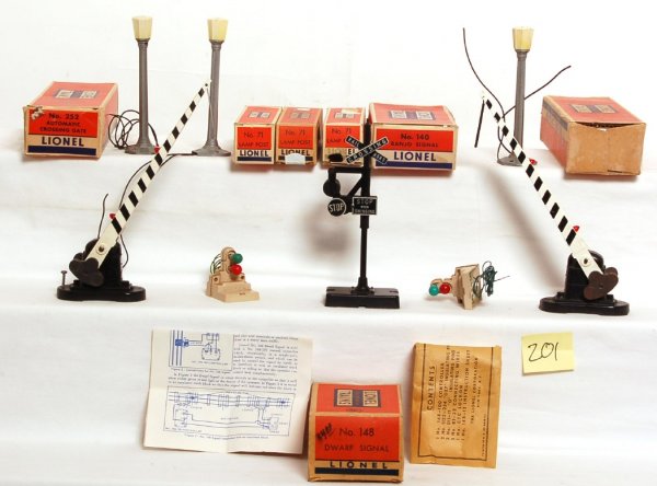Three Lionel No. 71, 140, two 252, 148 in OB 