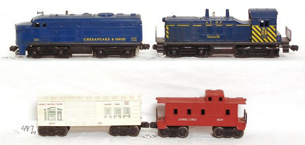 Lionel 225 Alco, 633 NW-2, 6050, 6017: Lionel 225 Chesapeake and Ohio Alco, 633 ATSF NW-2, 6050 Lionel Savings Bank boxcar, 6017 caboose, 633 has some light surface rust on frame otherwise trains look C6. Both power units were bench tested