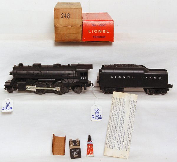 Unrun Lionel 248 2-4-2 loco, 1130T tender in OB: Unrun Lionel postwar 248 2-4-2 loco with unrun 1130T tender, both in original boxes, trains should clean to look C9-10. Insert for loco cab, small tube of grease, CTC lockon and original instructions