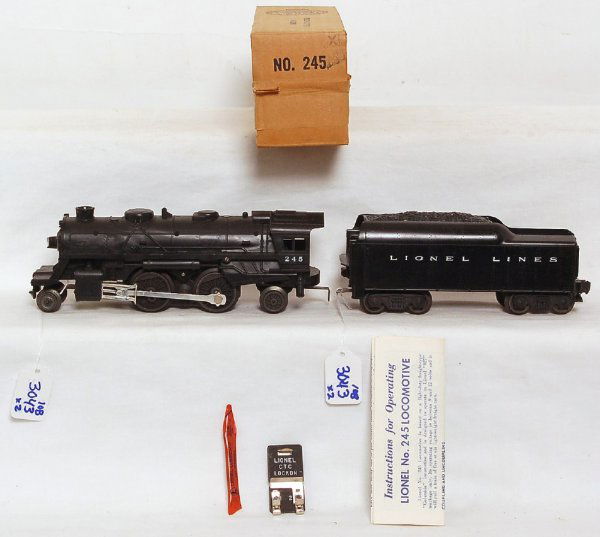 Lionel 245 2-4-2 loco and 1130T tender loco in OB: Lionel 245 2-4-2 loco and 1130T tender with loco in original box. Loco has the absolute faintest test run line on wheels, most would call this loco unrun, otherwise loco and tender look C9-10. Loco bo