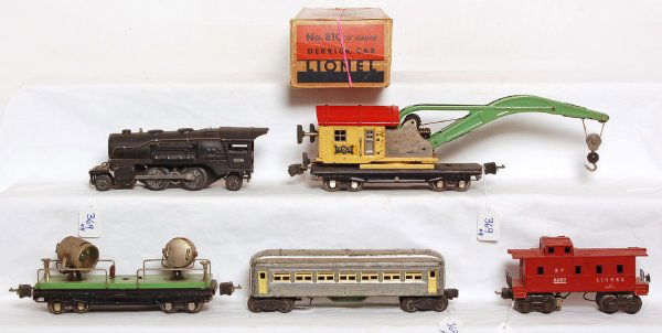Lionel 258, 810 in OB, 820, caboose, Pullman: Lionel 258 2-4-2 loco missing boiler front. 810 crane in OB missing hook/tab portion of one coupler and one hand grab, box is missing flaps on one end with insert. 820 searchlight car, 6257 post war s
