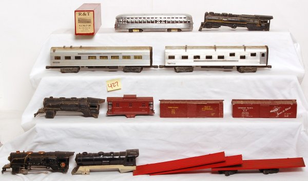 Box of O gauge trains, cars, trolley kit, more