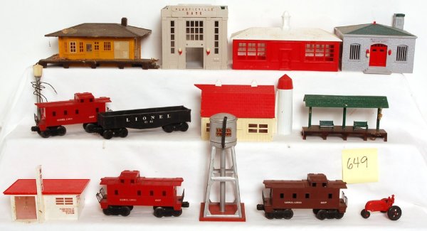 Big lot of toy train related parts and pieces