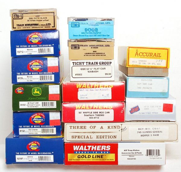 Sixteen Athearn, Walthers, Accurail and others: Athearn: 8132 Rio Grande 40 foot flatcar w/John Deere Ford C No. D&RGW 22323 w/Kadees, 8152 Rio Grande 40 foot flatcar with model B tractors No. D&RGW 22317 w/Kadees, 8135 Monon 50 foot flatcar w/John